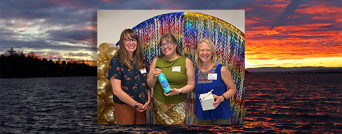 McKenzie and Sam smile with the award